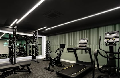 a home gym with weights and other exercise equipment