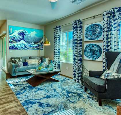 a living room with a couch and a table at Craft at Gilbert and Baseline, Mesa, AZ 85204