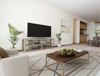 Living room at Sycamore Apartments in Holt, MI 