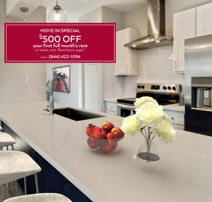 an image of a kitchen with a promotion for 500 off
