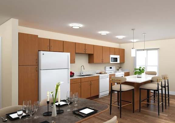 Open kitchen dining area with white island seating at Turquoise Trail Apartments, Santa Fe, NM 87508
