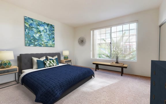 a bedroom with a bed and a tv
