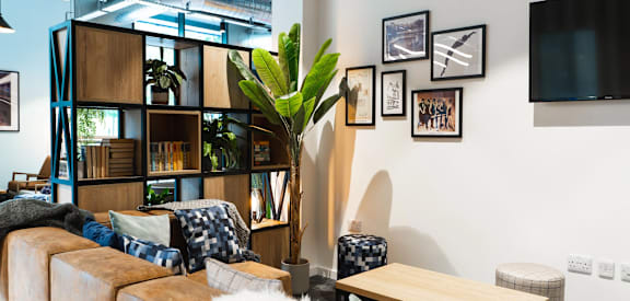 a living room with a couch and a table
