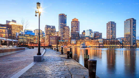 a view of the city skyline at dusk