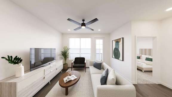 Living area with white sofa and TV at The Maverick Luxury Apartments, Monument, 80132
