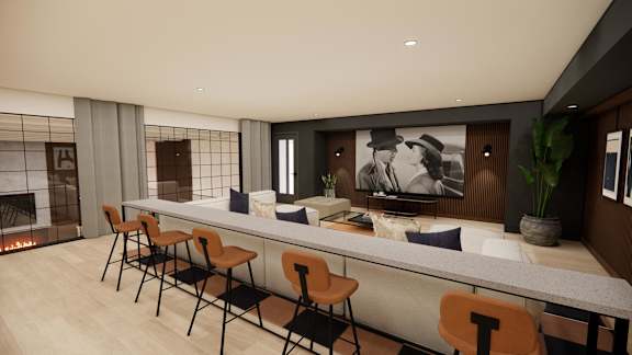 A modern room with a long table and chairs.