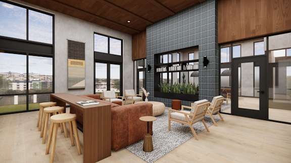 A modern interior with a bar area and people sitting at it.