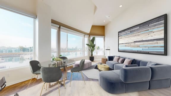a living room filled with furniture and a table and chairs  at Esprit Apartments, Marina del Rey, CA, 90292