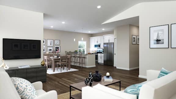 A modern living room with a white sofa and a wooden coffee table.