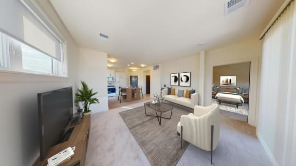 a living room with a couch and a tv