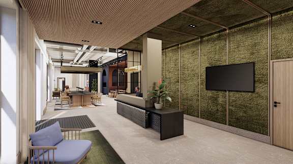 A modern living room with a flat screen TV mounted on the wall.