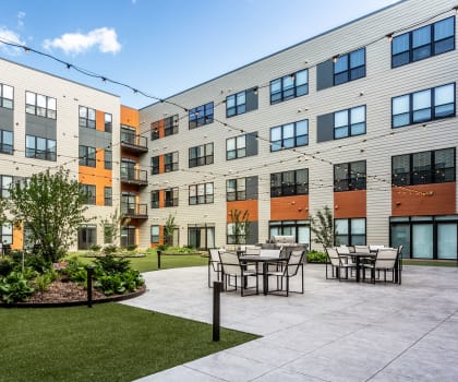 Vim + Vigor Lofts outdoor recreational area with grass field Apartments in Milwaukee, WI