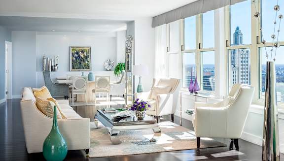 A living room with white furniture at Residences Providence, Providence
