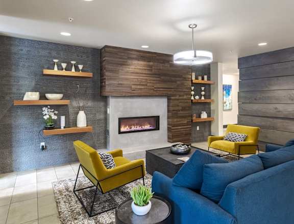 Living room with a fireplace at Kirkland Crossing Apartments, Washington