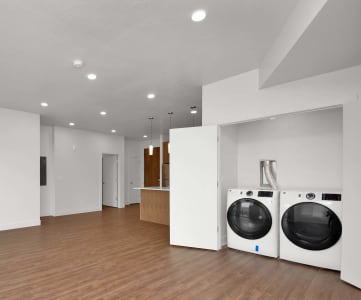 a laundry room with a washer and dryer