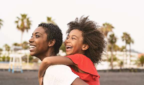 Mother and Daughter Laughing at Legacy Farm Apartments in Collierville, TN