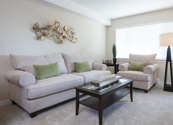 a living room with a couch and a coffee table