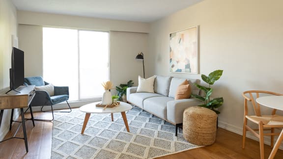 a living room with a couch and a table