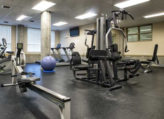 a gym with weights and other exercise equipment