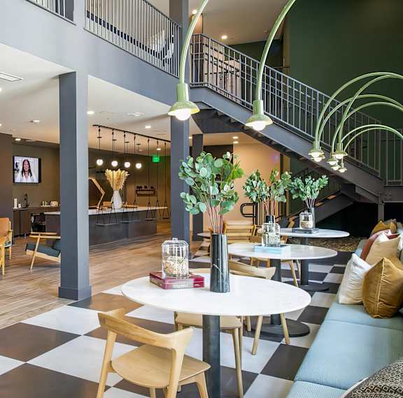 Inspiring and creative game room with fun lighting, rope swings, and more at Novel Cary