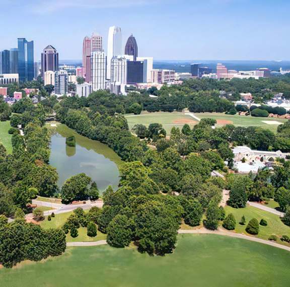 Vibrant Atlanta Neighborhood with Towering Skyline and Expansive Green Space Near Tens on West