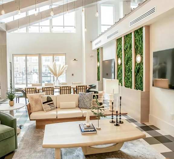 Alta Wren Open-Concept Clubroom with Vertical Garden Wall
