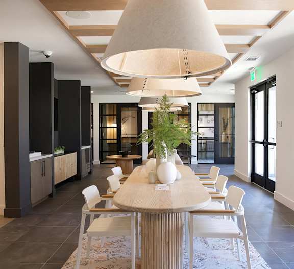Sophisticated working area with countertop wired with plugs for easy charging at Novel Cary