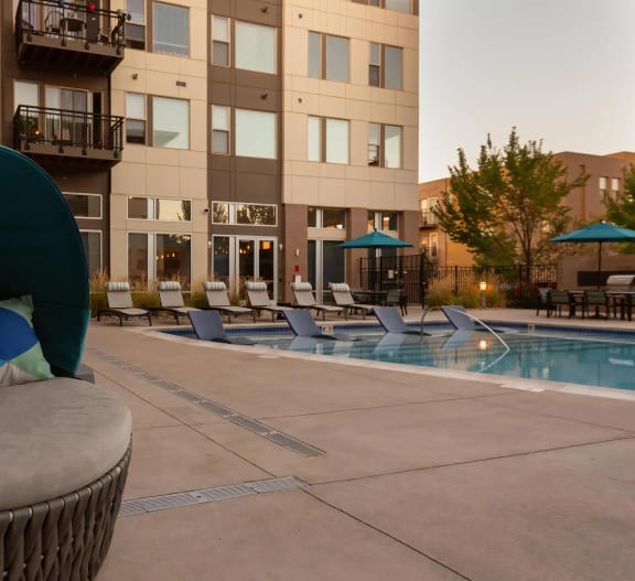 Poolside Relaxed Lounge Chairs, Trifecta Belmar,  Lakewood, CO Luxury Apartments