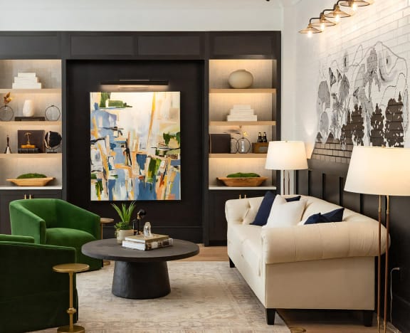 Luxurious social seating with an inspiring feature wall of art and sculptures at Novel Harpeth Heights
