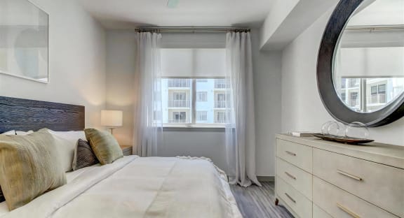 Spacious Bedroom with Wood Style Flooring
