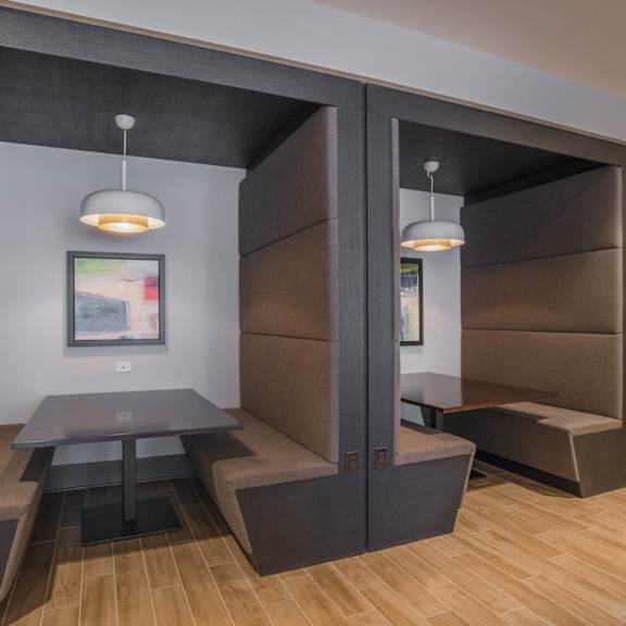 a bowling alley in the lobby of a hotel with bowling lanes at The Elle Apartments in Chicago, IL 60605