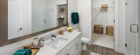 Spacious Bathrooms with Walk In Closets