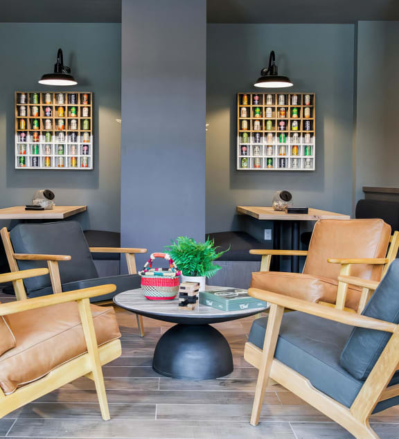 Indoor social area with comfy seating and private booths at Novel Cary