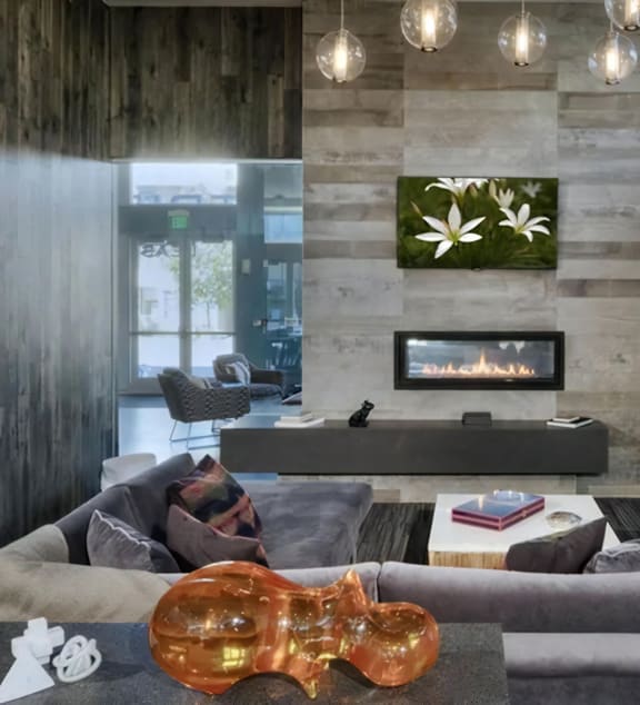 Indoor Lounge with Fireplace and TV