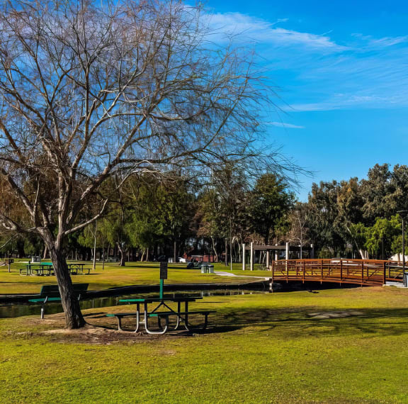 a park with a lake and a bridge at Amerige Pointe, California, 92833