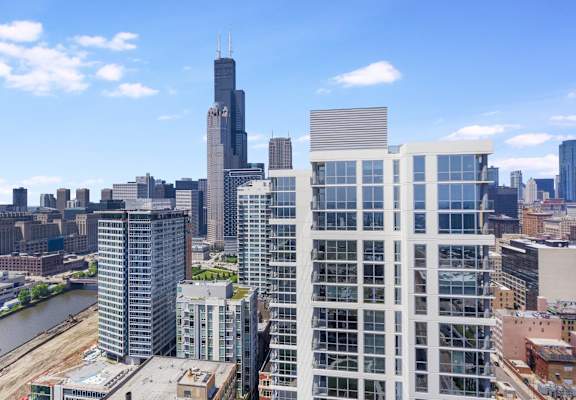 a view of the skyline from a high rise building at The Elle Apartments in Chicago, IL 60605