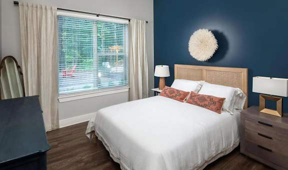 Large Windows Allow In Plentiful Natural Light Featuring Blinds