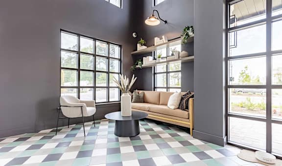 a living room with a checkered floor and a yellow couch