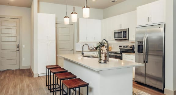 Spacious Kitchen with Island Including Breakfast Bar