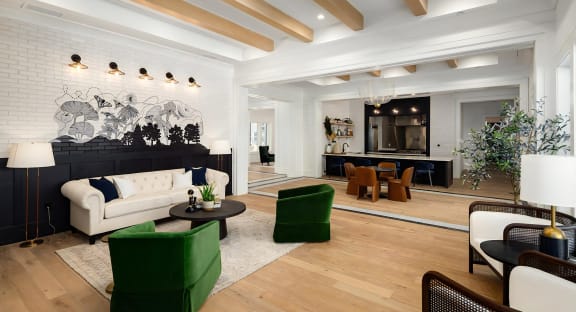 Artistic lounge area with playful wall art and sophisticated finishes at Novel Harpeth Heights