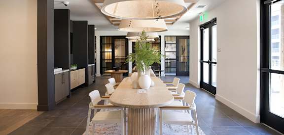 Sophisticated working area with countertop wired with plugs for easy charging at Novel Cary
