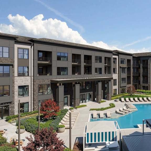 our apartments have a large swimming pool with an umbrella