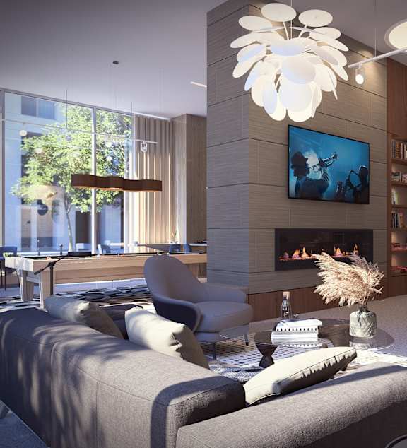 A modern living room with a fireplace and a large painting on the wall.