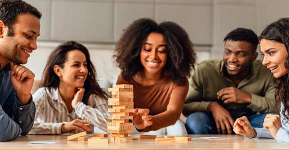 Group of people are playing a game of Jenga1 at Cordova Creek Apartments, Tennessee, 38016