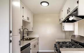 the preserve at ballantyne commons apartment kitchen with stove and sink at Colima Terrace Apts, Rowland Heights, CA 91748