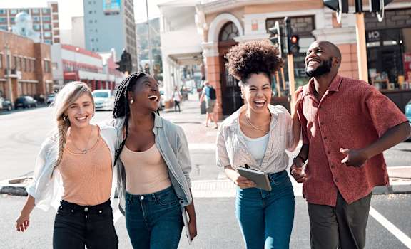 a group of people walking down a city street at Mirabelle Luxury Apartments, Kansas City, 64111