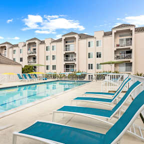 Pool With Relaxing Chairs at La Regencia Apartments, San Diego, 92122