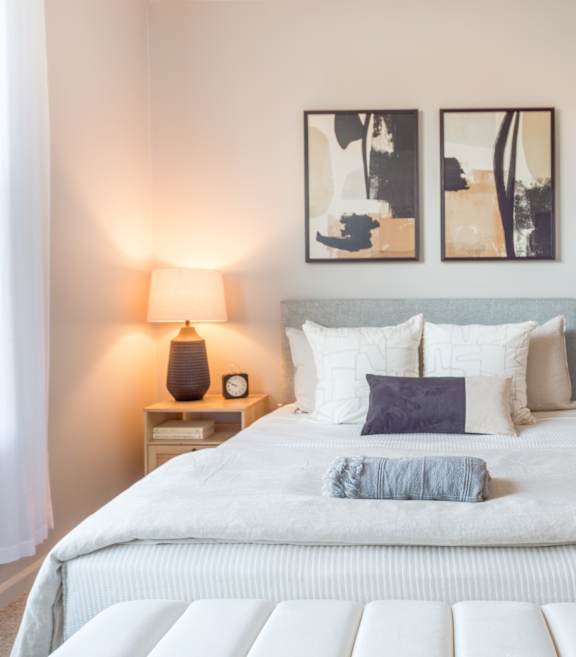 a bedroom with a large window at Heights at Glen Mills, Glen Mills, PA