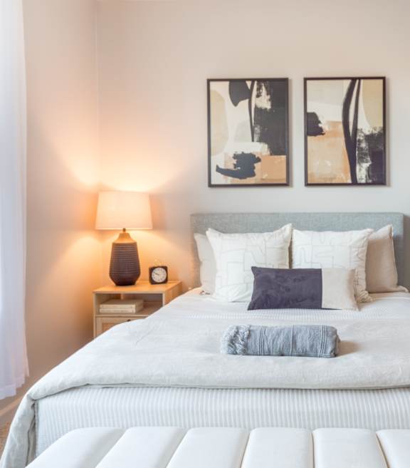 a bedroom with a large window at Heights at Glen Mills, Glen Mills, PA