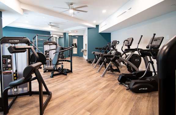 Fitness center at NOVI featuring cardio equipment.